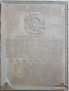 bronze plaque before restoration