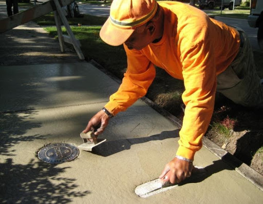 whitefish bay historic medallion plaque being implemented into sidewalk